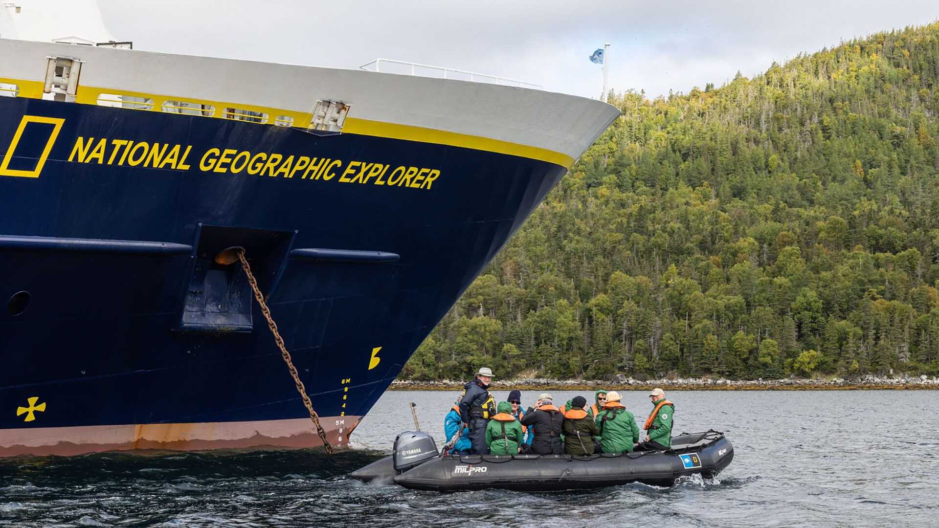 bow of the national geographic explorer with a zodiac craft in the foreground