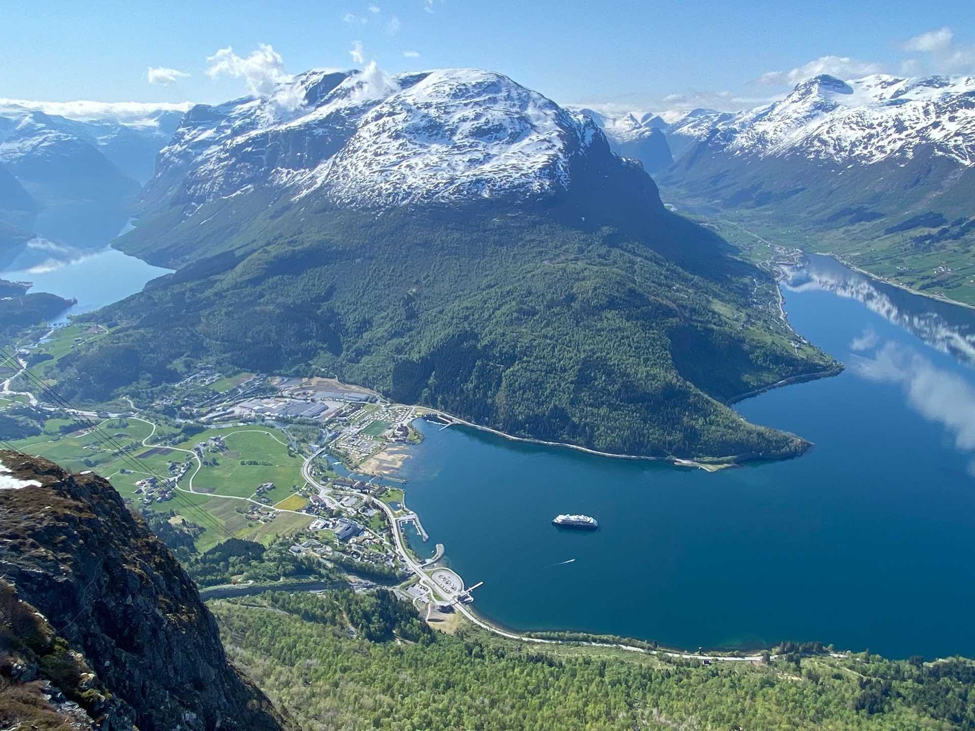 aerial view of norwegian coast with National Geographic Endurance anchored offshore