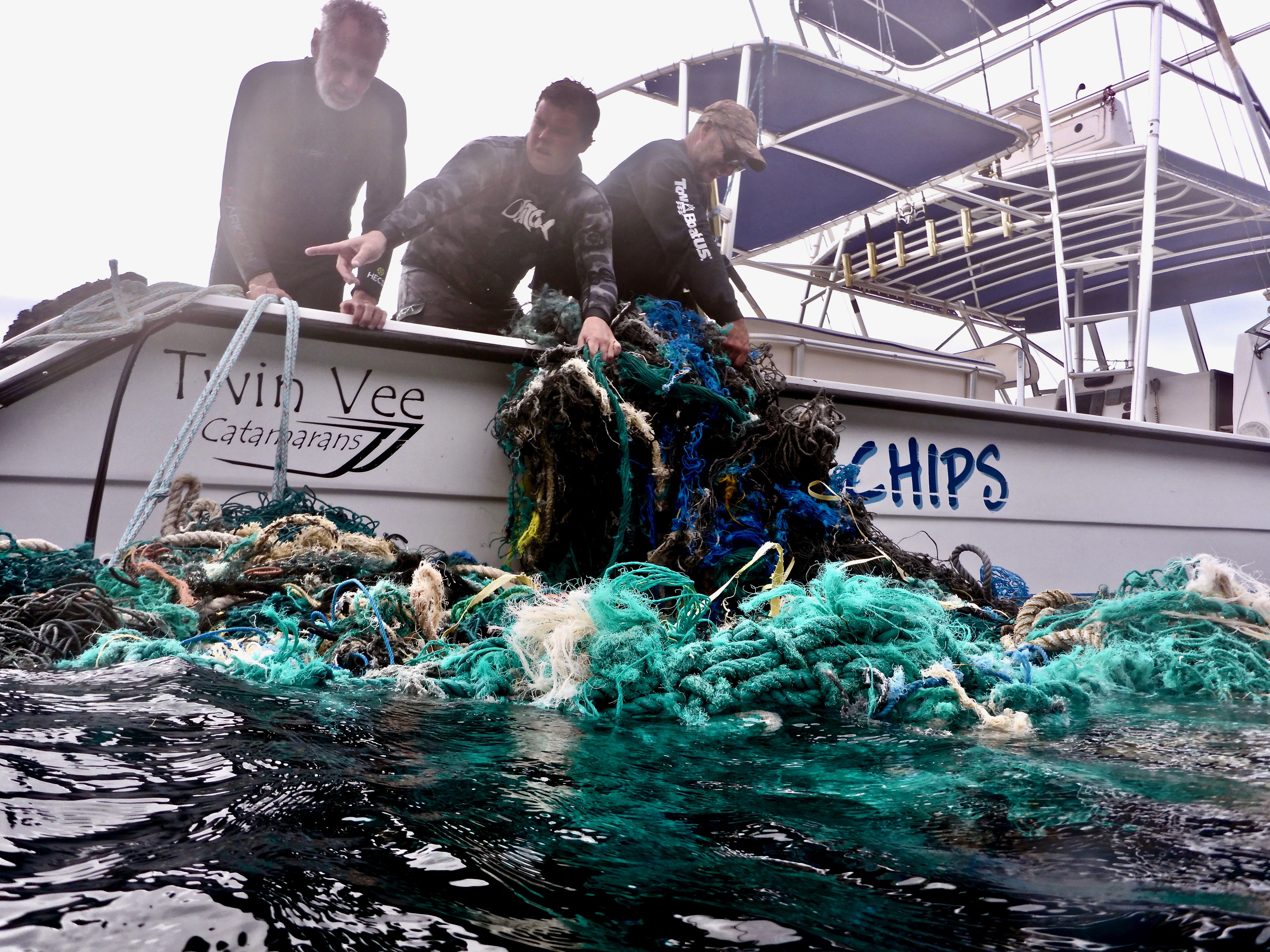 Sven Hauling Nets On Boat.jpg